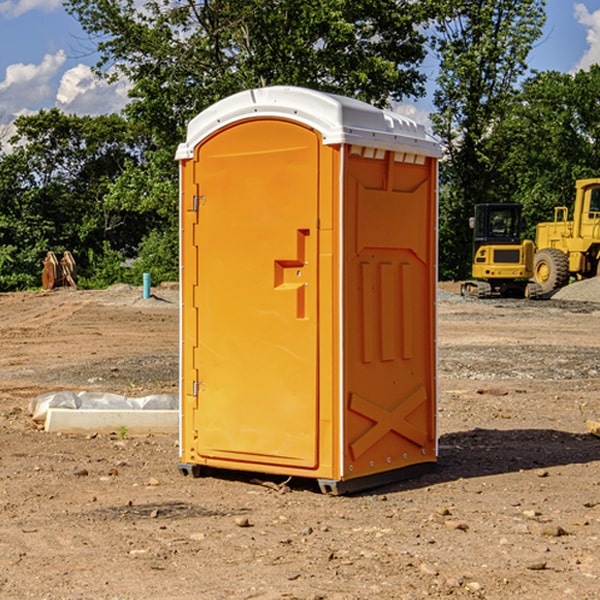 what is the cost difference between standard and deluxe portable toilet rentals in Akaska SD